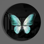 Turquoise vlinder op zwart – Rond Glasschilderij
