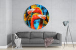 Twee oranje flamingo's op blauw – Rond Glasschilderij