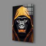 Gele met capuchon gorilla goud Grin – Glasschilderij