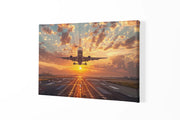 Canvas schilderij van een vliegtuig bij zonsondergang