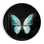 Turquoise vlinder op zwart – Rond Glasschilderij