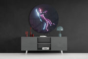 Vallende figuur in neongloed – Rond Glasschilderij